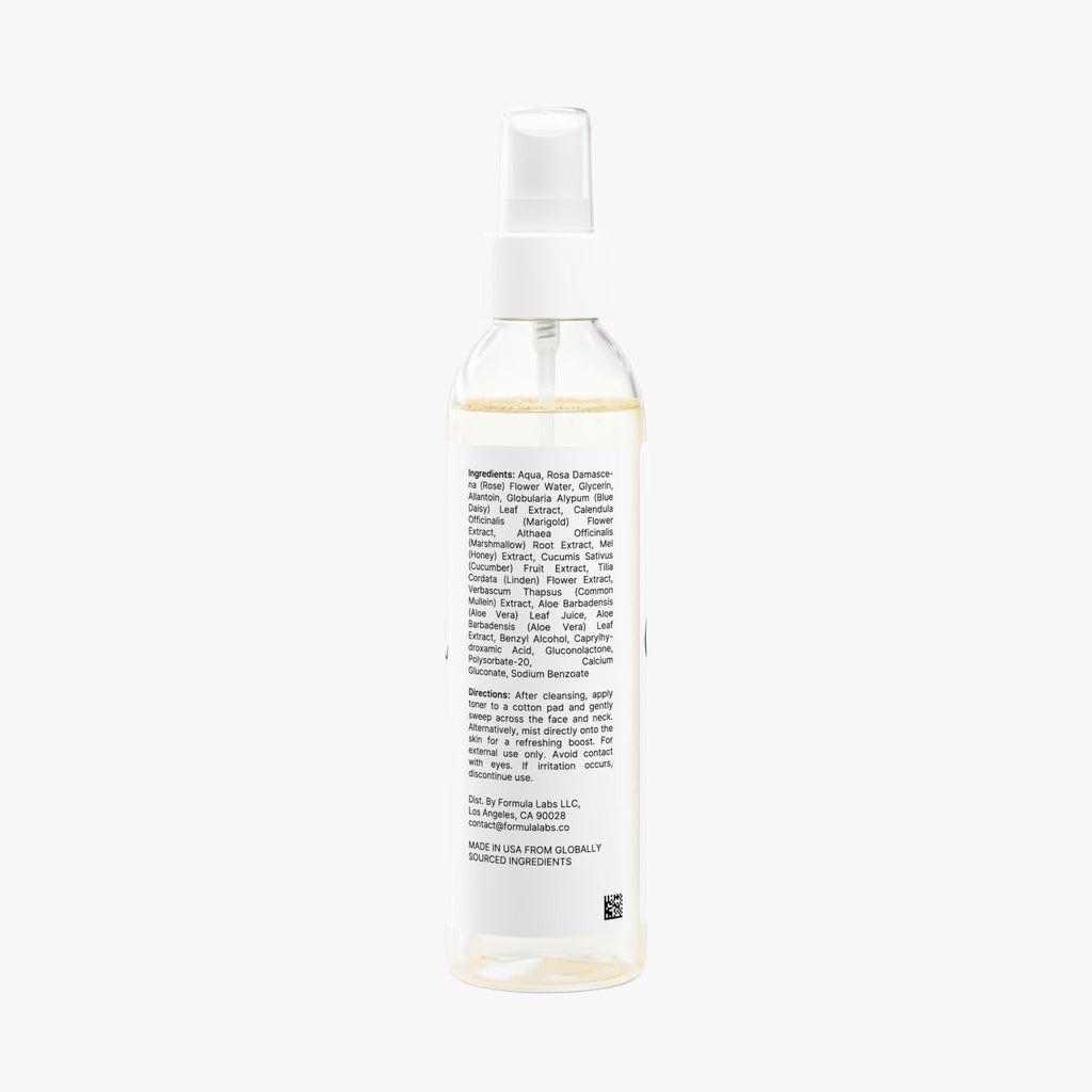 Clear bottle with white cap on a white background
