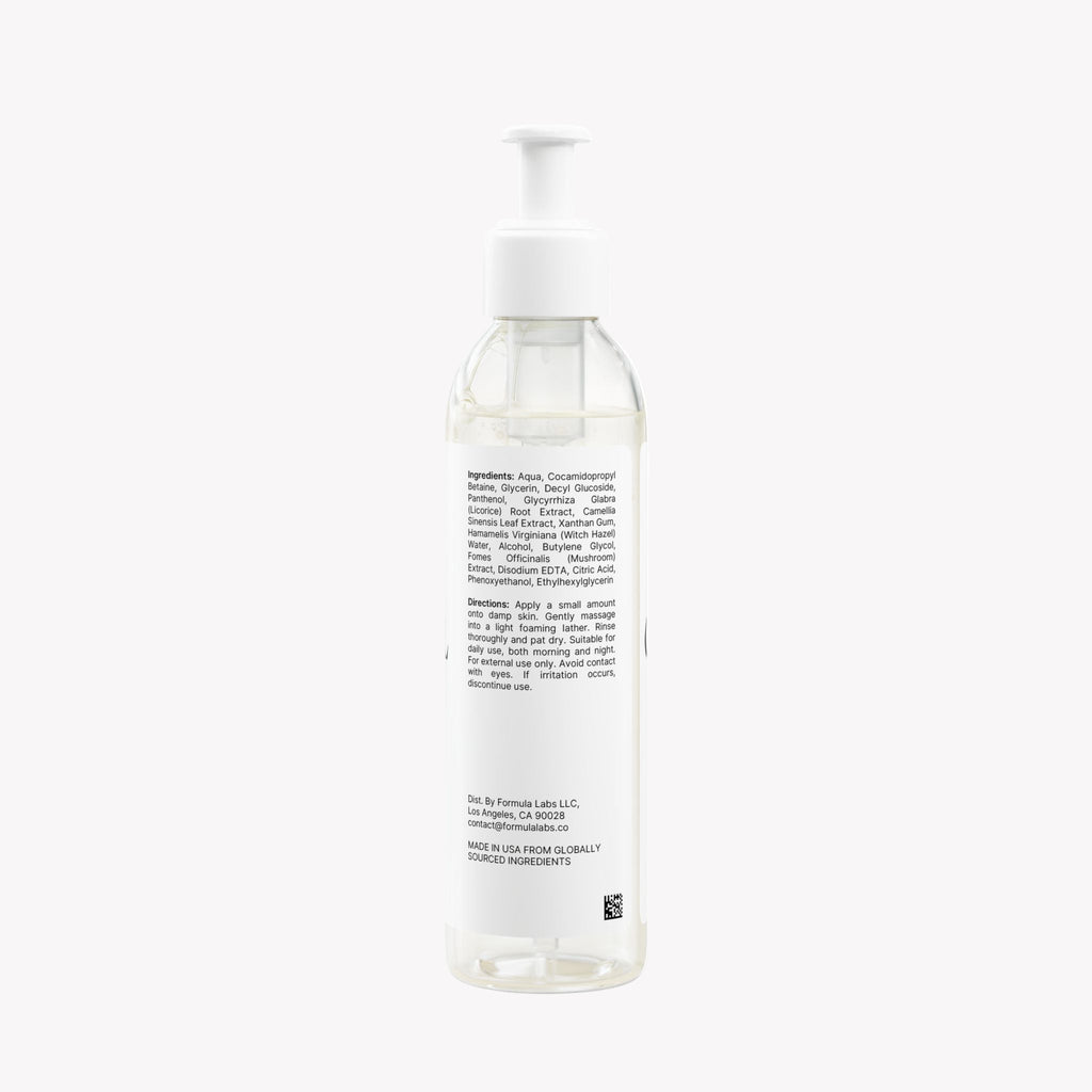 Clear bottle with a white pump on a white background