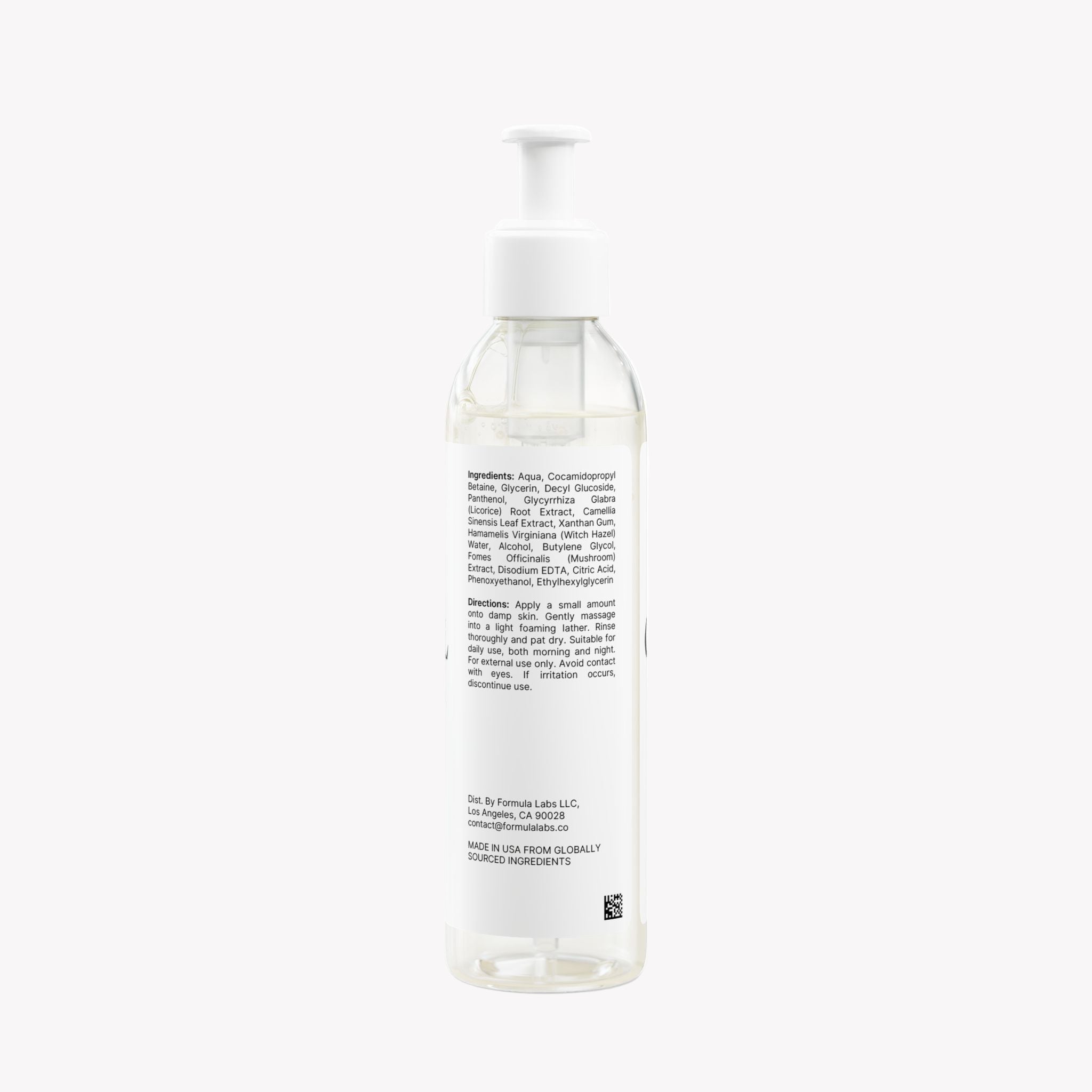 Clear bottle with a white pump on a white background